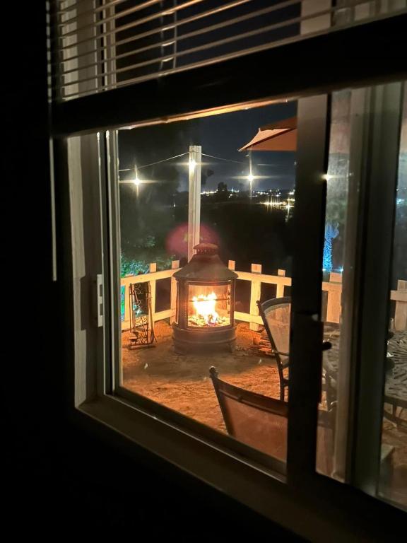 a view of a fire pit from a window at Rancho 29 VDG in Ensenada