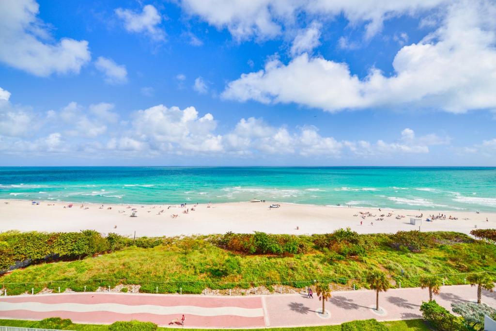 an aerial view of a beach with people on it at Ocean Breeze Retreat in Miami Beach in Miami Beach