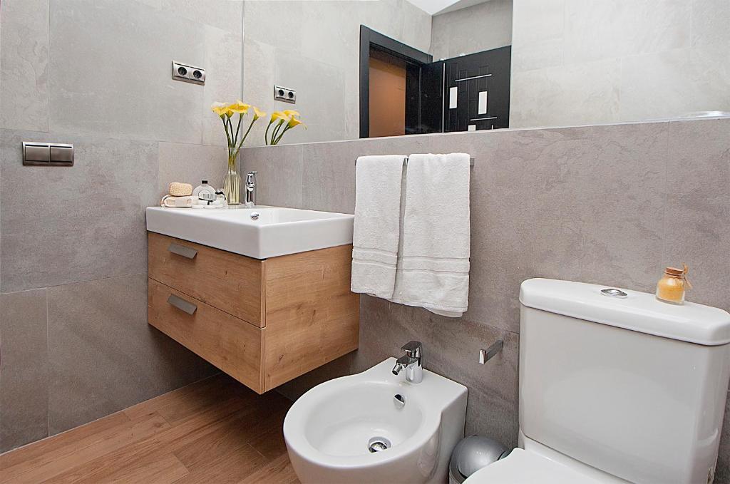 Kúpeľňa v ubytovaní Apartamentos Suites Oficentro Deluxe