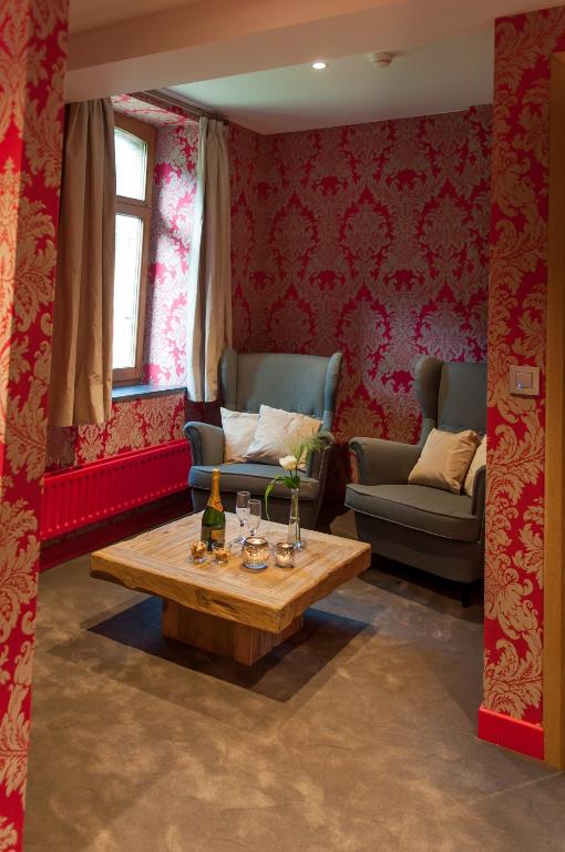Posezení v ubytování River Lodge Hotel Insolite