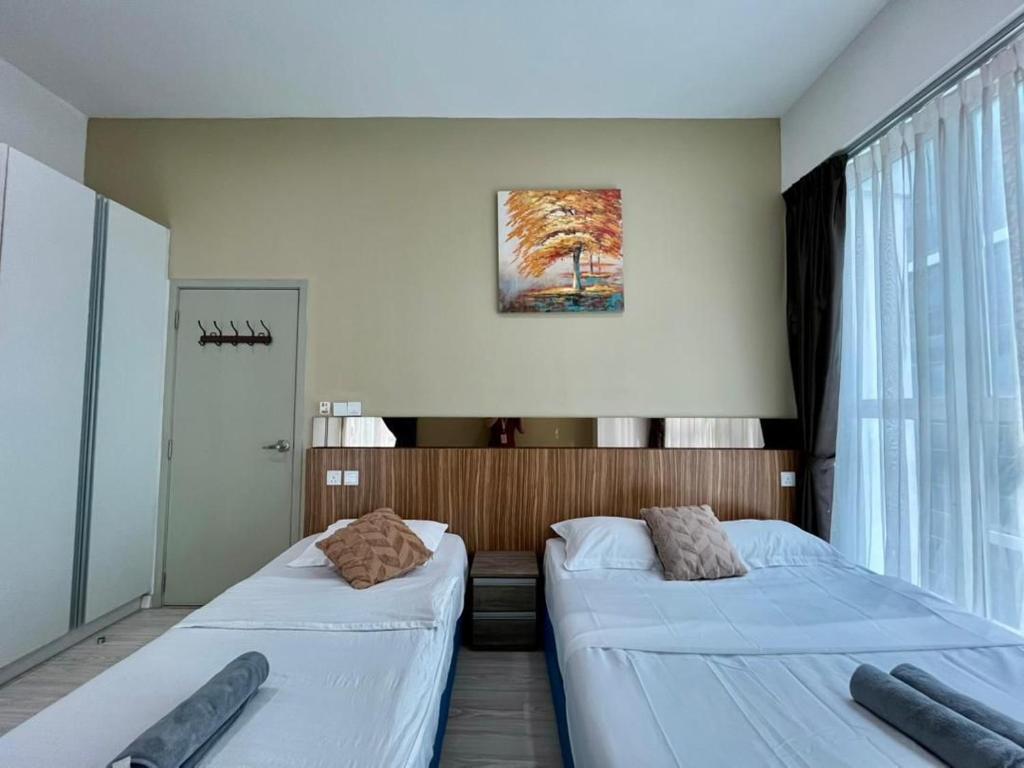 Ένα ή περισσότερα κρεβάτια σε δωμάτιο στο SUTERA AVENUE T2 2BEDROOM by GC near imago kk