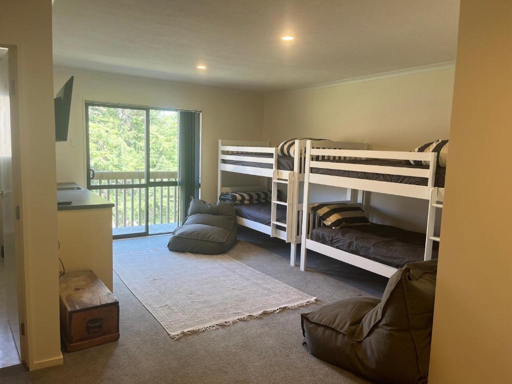 Ένα ή περισσότερα κρεβάτια σε δωμάτιο στο Tipapa Deer Park Lodge