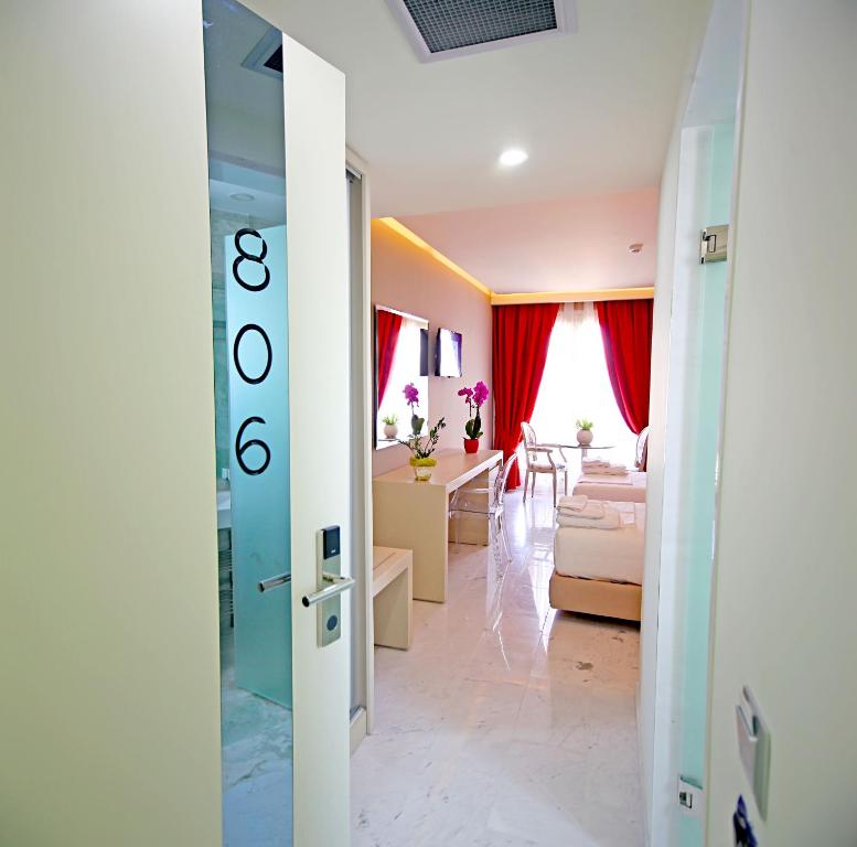 Postel nebo postele na pokoji v ubytování Hotel Palace
