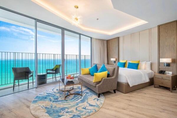 Giường trong phòng chung tại Winsgroup - Suites Panorama Grand