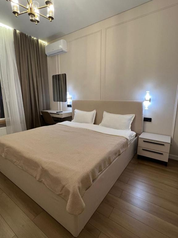 Ένα ή περισσότερα κρεβάτια σε δωμάτιο στο Estet 31 Business Plus Mega Center