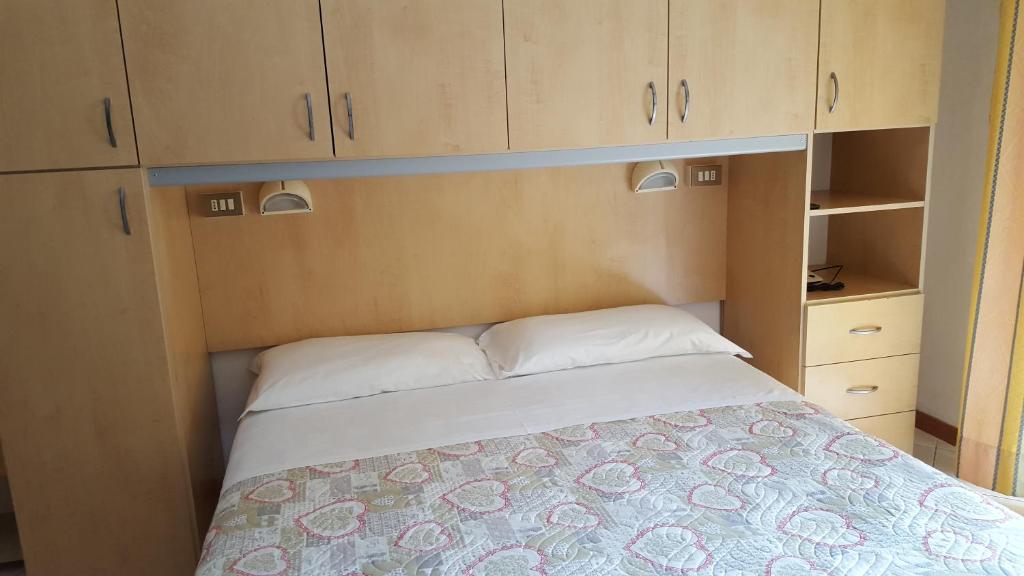 Postel nebo postele na pokoji v ubytování Hotel Canova