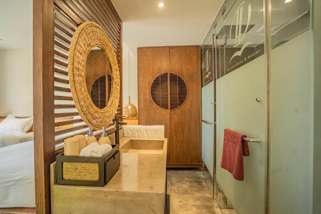 Giường trong phòng chung tại The Signature Hotel Nha Trang