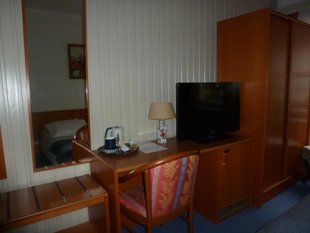 TV a/nebo společenská místnost v ubytování Hotel 'T Hert