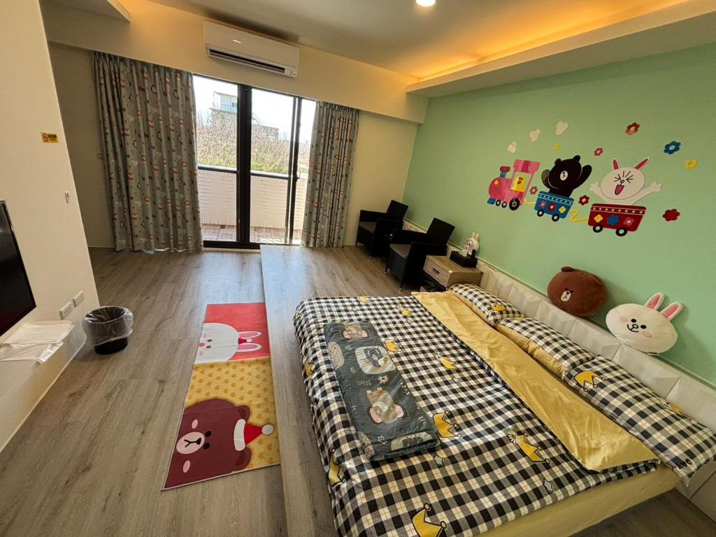 Ένα ή περισσότερα κρεβάτια σε δωμάτιο στο Fu Lai Residence