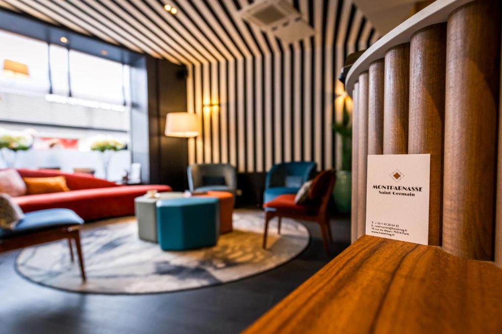 Χώρος καθιστικού στο Hôtel Montparnasse Saint Germain