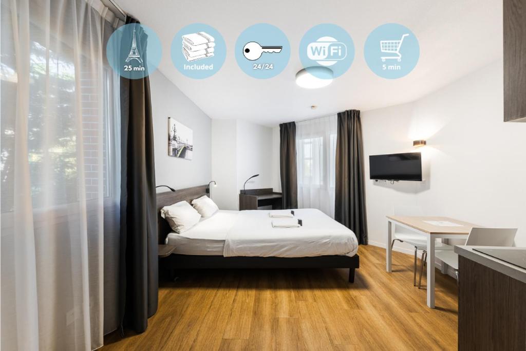 ein Schlafzimmer mit einem Bett, einem Schreibtisch und einem Fernseher in der Unterkunft Cozy Marne - 2 people - Paris in Nogent-sur-Marne