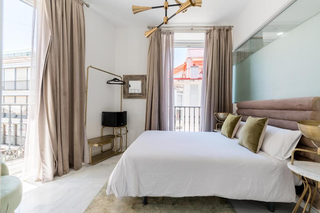Cama o camas de una habitación en Hostal Roomsole