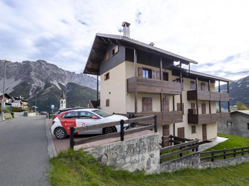 a car parked in front of a house at Apartment Oga Mountain Home by Interhome in Oga