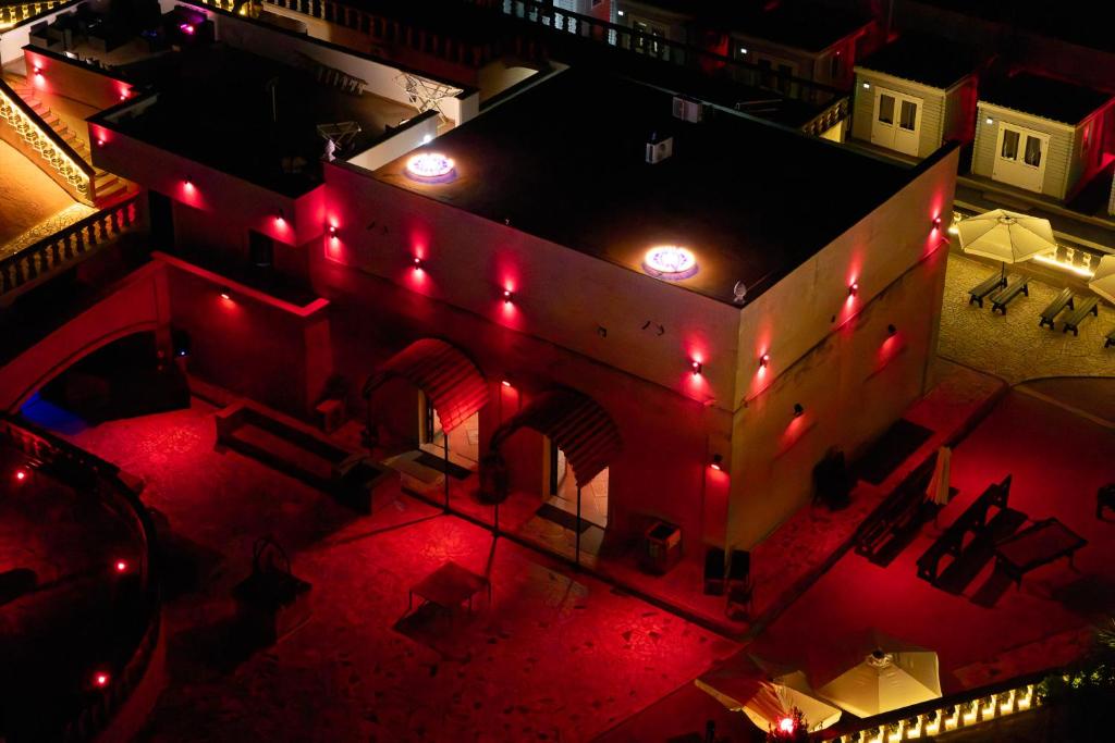 an overhead view of a building with red lights at Tenuta delle Marene - Only Adults in Torricella