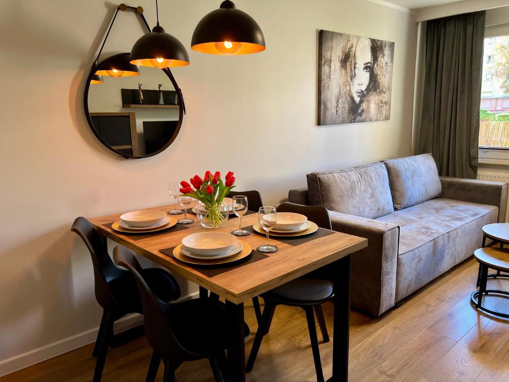 Posezení v ubytování Apartament Centrum Szczecinek - f-vat