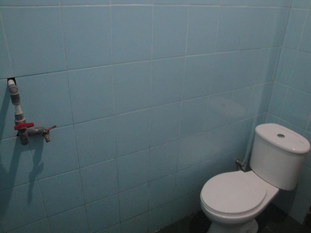 Koupelna v ubytování Sawe Homestay