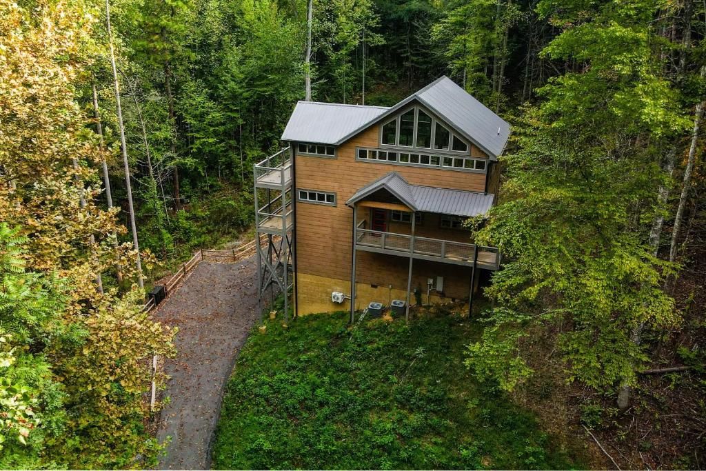 an aerial view of a house in the woods at Multi Level Getaway Pool Hot Tub and Fireplace in Pittman Center