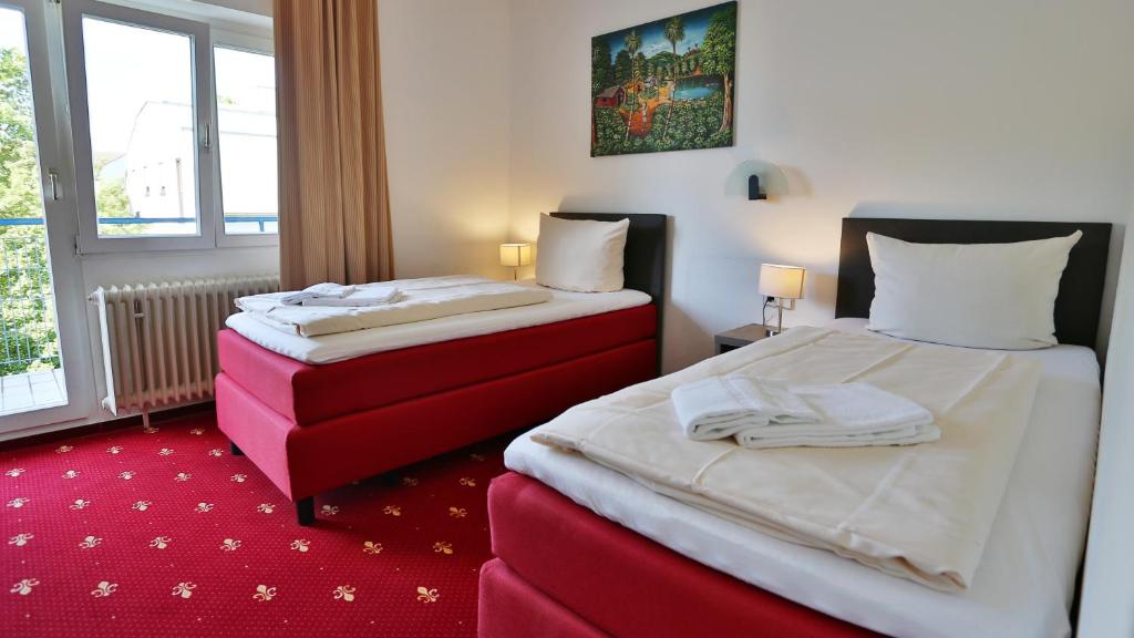 Postel nebo postele na pokoji v ubytování Hotel Maurer