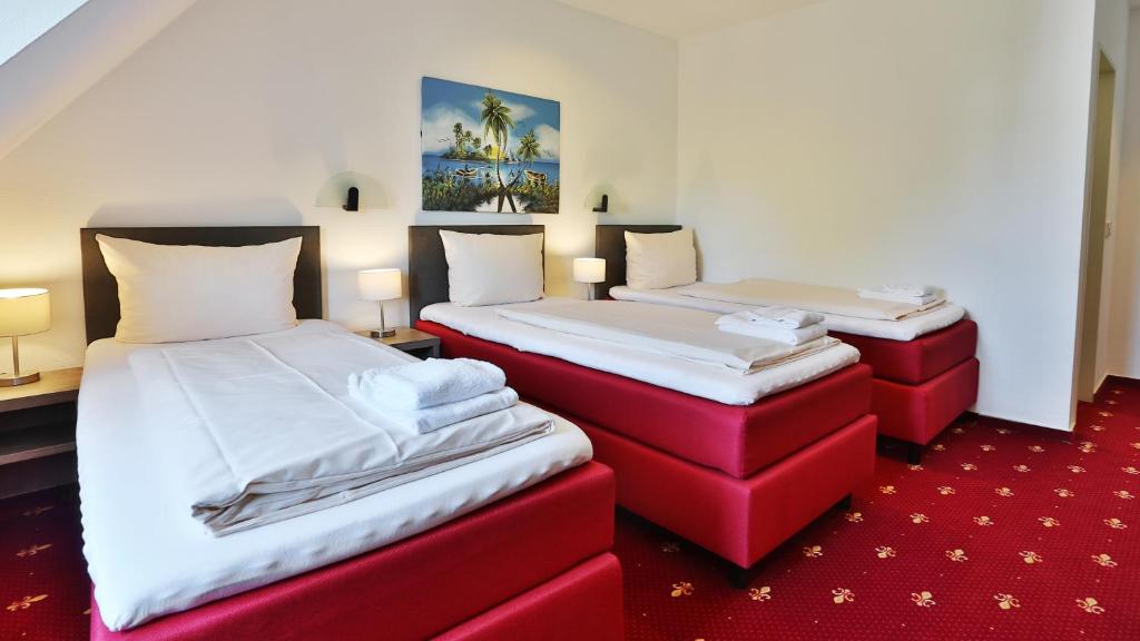 Postel nebo postele na pokoji v ubytování Hotel Maurer