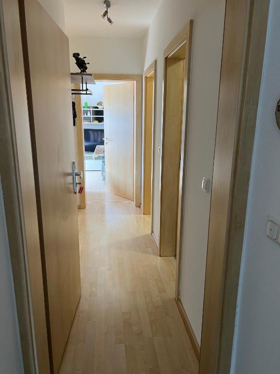 a hallway with two doors and a hallway with a hallway at Hinter-Apartments West in Rohrbach