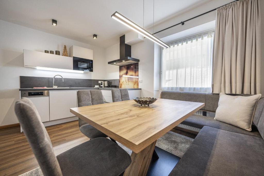 Η κουζίνα ή μικρή κουζίνα στο Pivan Apartments