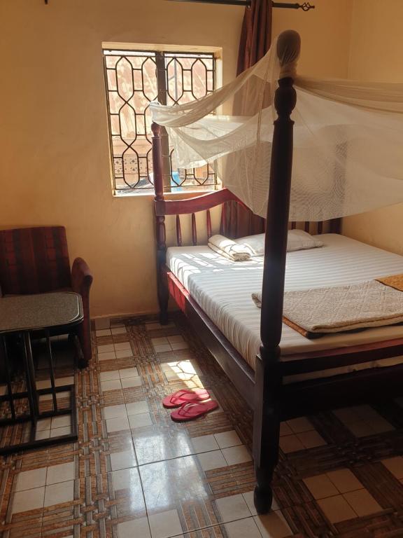 Postel nebo postele na pokoji v ubytování KBK Comfort Accommodation