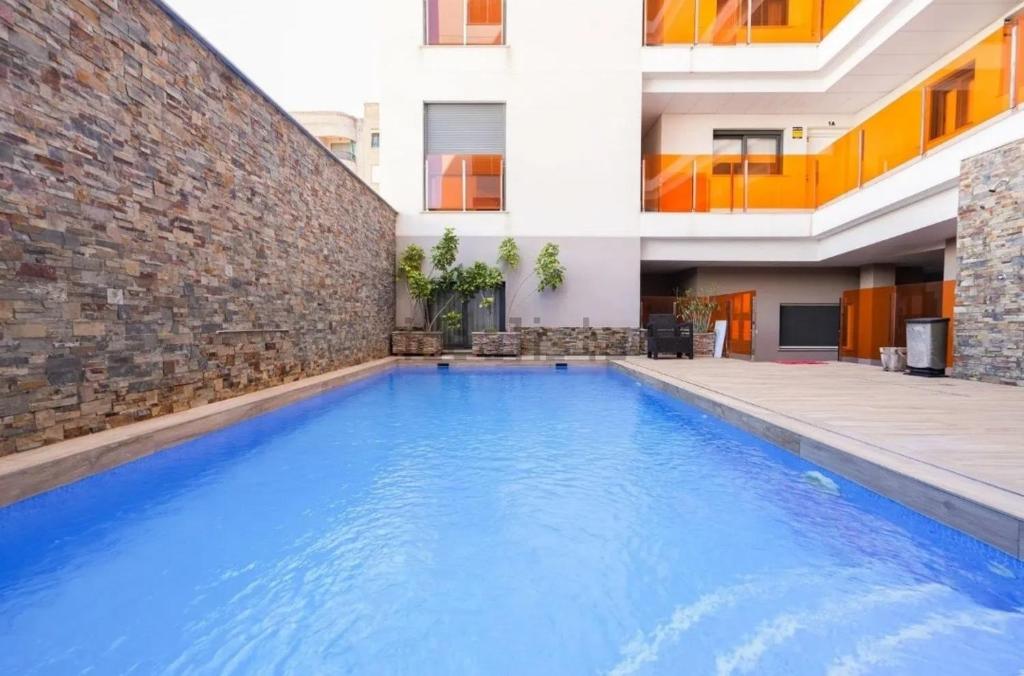 Swimmingpoolen hos eller tæt på Apartment mit Pool und Parking nähe Playa del Cura, Torrevieja
