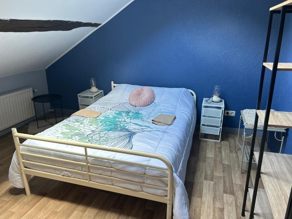 Postel nebo postele na pokoji v ubytování Chez Germaine