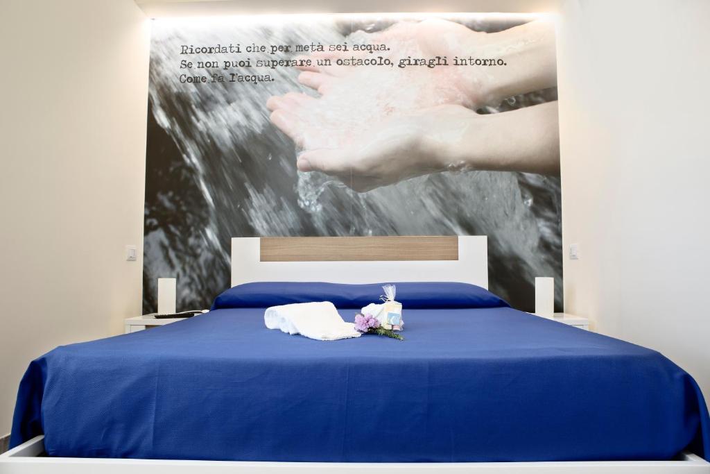 Postel nebo postele na pokoji v ubytování La Giara Guest House