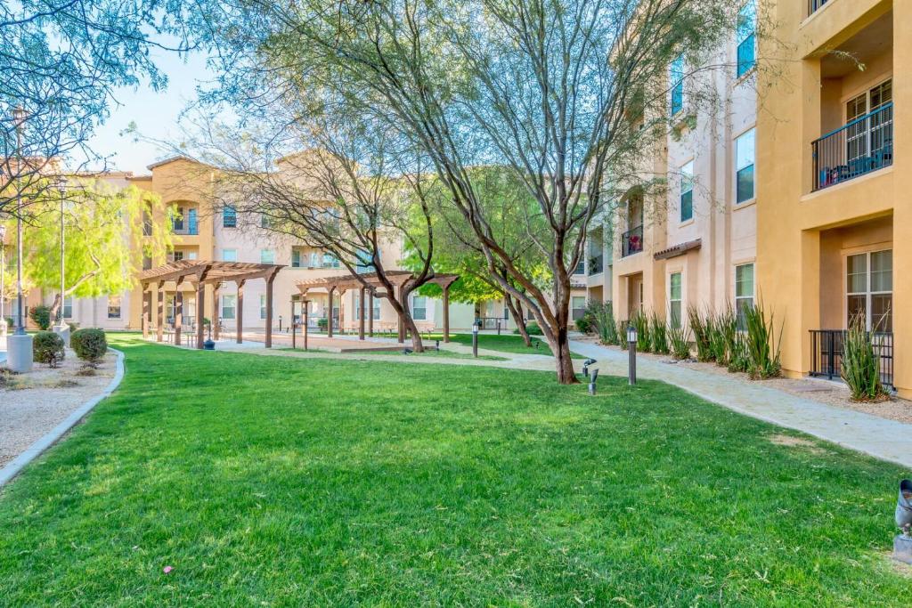 a park in the courtyard of a apartment building at Mountain View #312 Surprise in Surprise