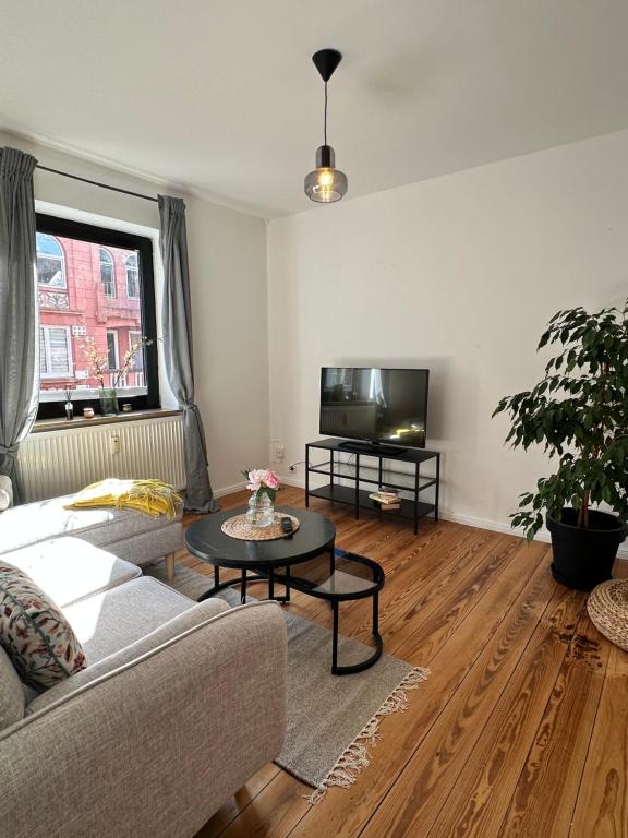 Posezení v ubytování Komfortable Stadtwohnung mit Terrasse