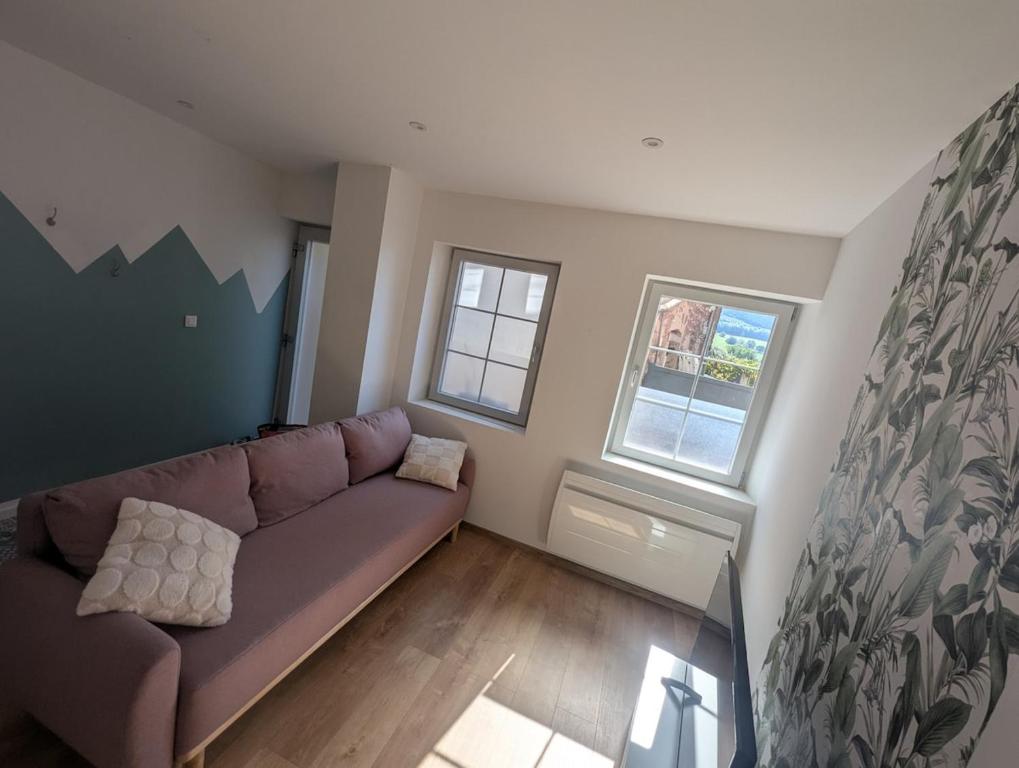 Ruang duduk di Le Triplex maison de ville rénovée