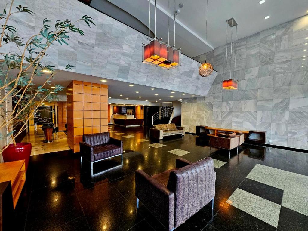 Χώρος καθιστικού στο Hotel Santoni