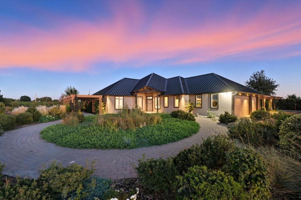 a house with solar panels on the roof at Book the Entire Eleanor Inn in Walla Walla