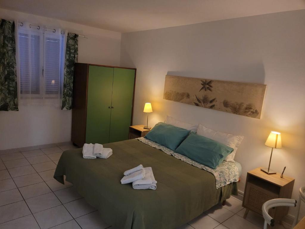 Ένα ή περισσότερα κρεβάτια σε δωμάτιο στο La Gru