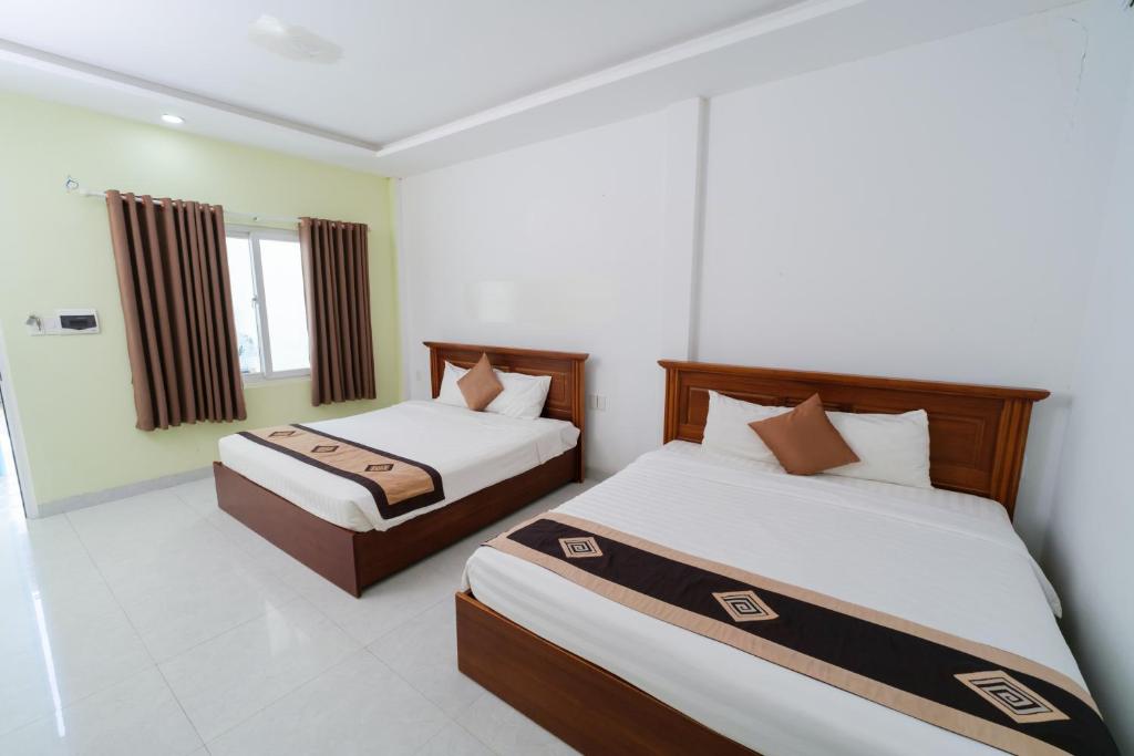 Mui Ne Volga Hotel & Apartments - Chambre Quadruple Économique