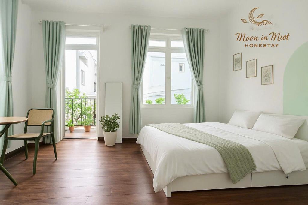 Postel nebo postele na pokoji v ubytování Moon in Mist Homestay