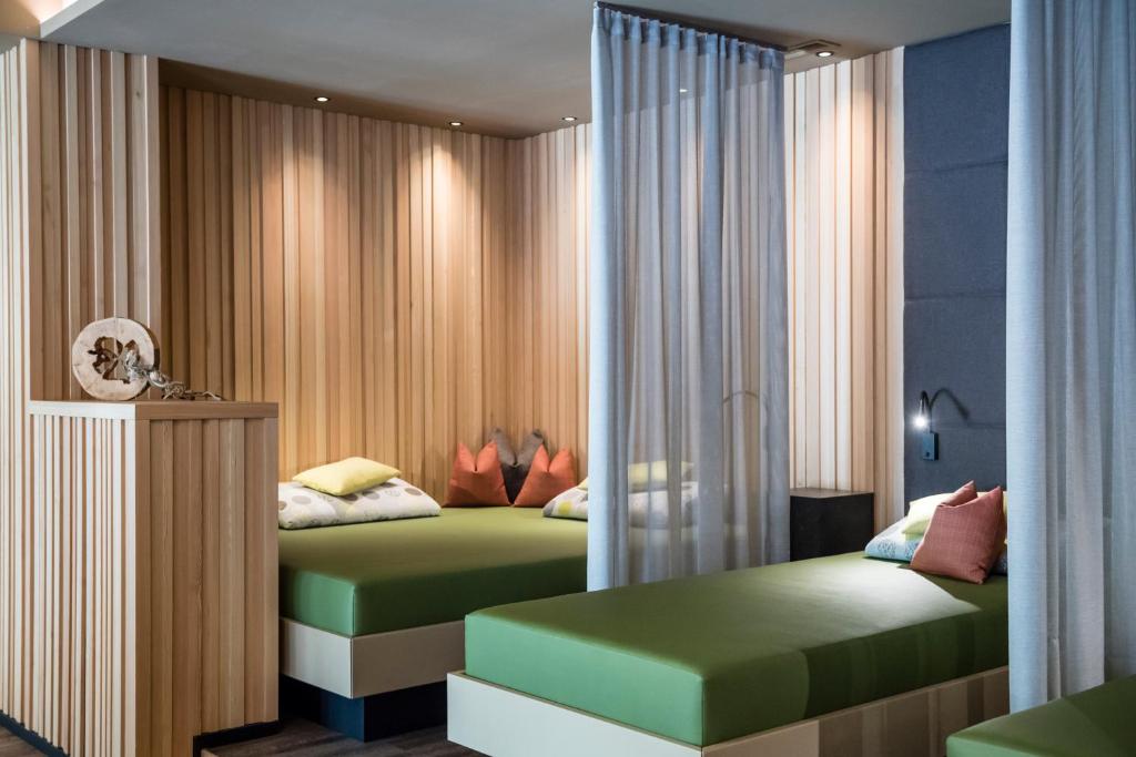 Postel nebo postele na pokoji v ubytování Hotel Gasserhof