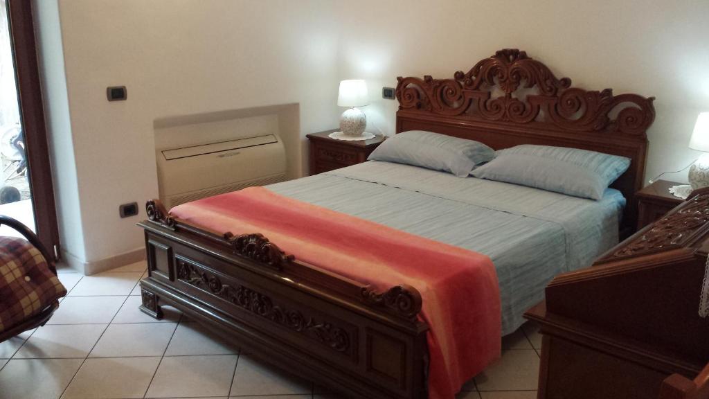 Postel nebo postele na pokoji v ubytování Cartaromana House