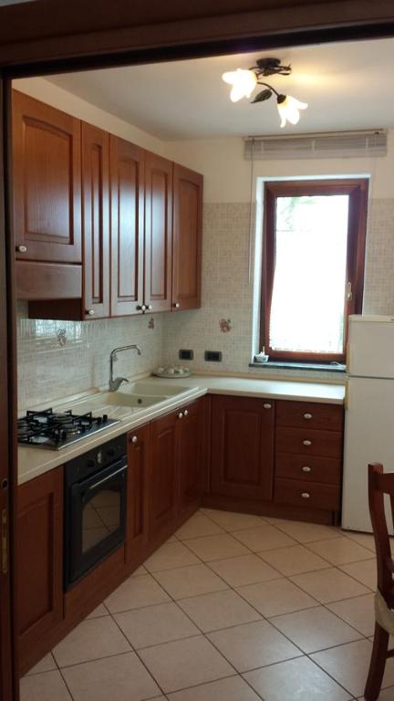 Kuchyň nebo kuchyňský kout v ubytování Cartaromana House