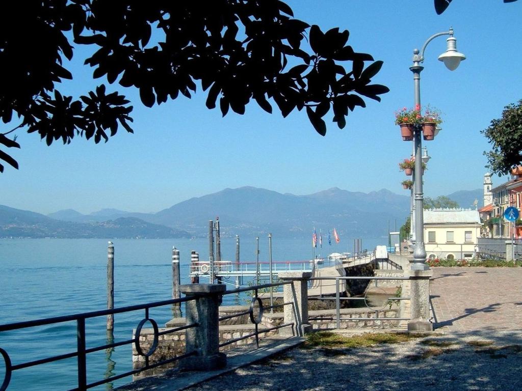 a view of the water and a pier at Belvilla by OYO Casa Marina a Ghiffa in Ghiffa