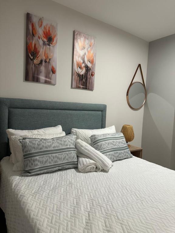 Ένα ή περισσότερα κρεβάτια σε δωμάτιο στο EchoPheme Suites