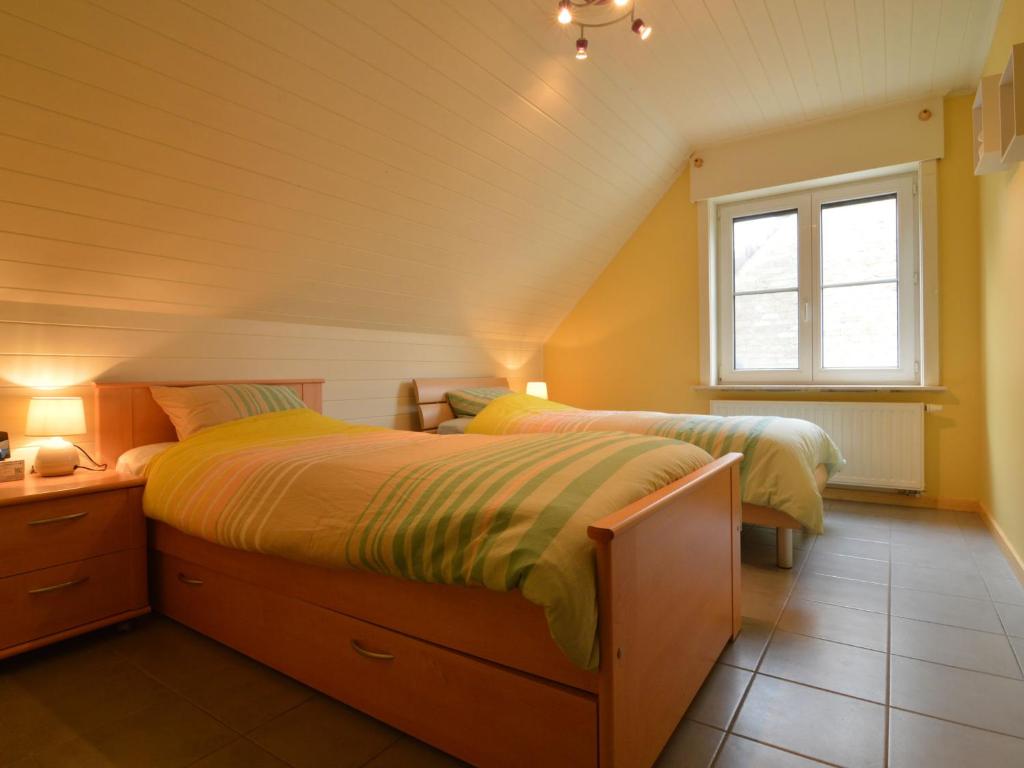 Postel nebo postele na pokoji v ubytování Villa in Diksmuide near Sandy Beach