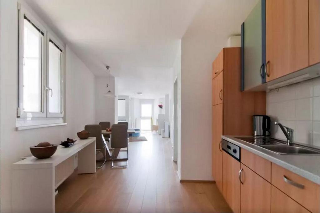 Kuchnia lub aneks kuchenny w obiekcie cosy apartment in perfect location