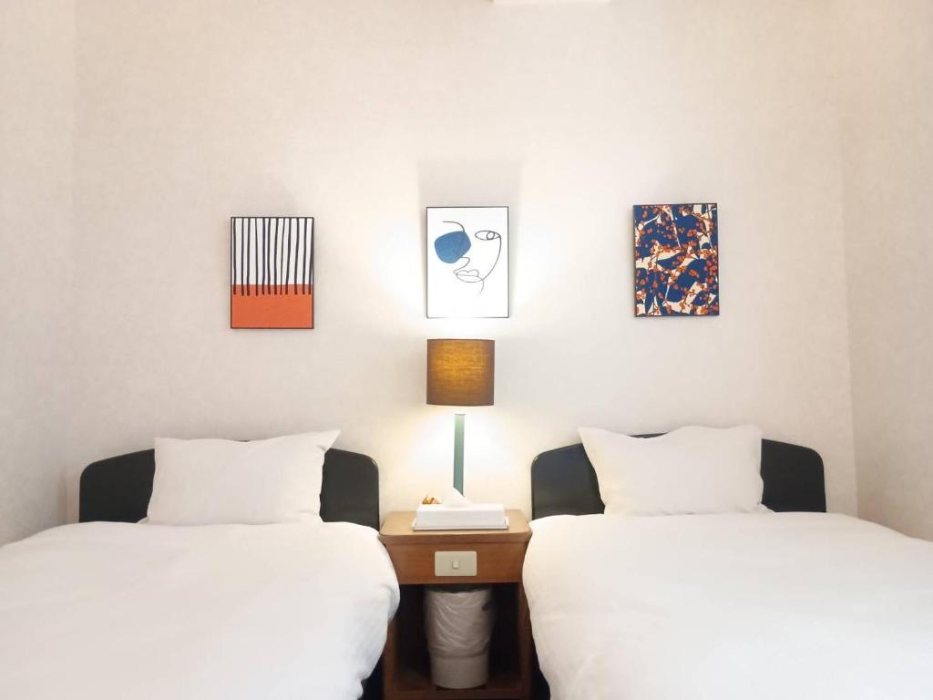 Voodi või voodid majutusasutuse Hotel-澄Sumi toas