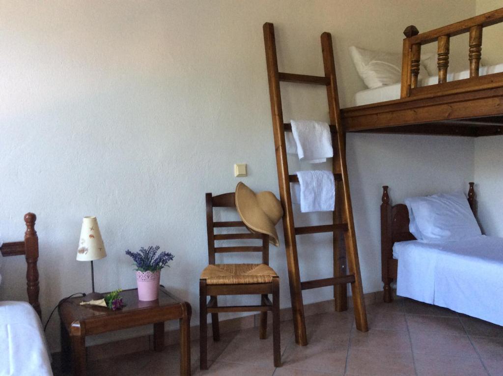 Postel nebo postele na pokoji v ubytování Aspasia's Villa