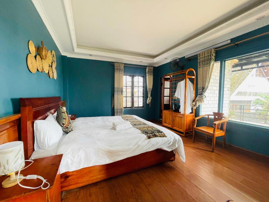 Ένα ή περισσότερα κρεβάτια σε δωμάτιο στο Sapa Binhlan Hostel