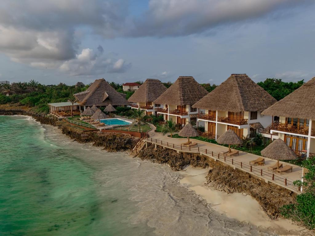 an aerial view of a resort on the beach at Mahi Mahi Beach Hotel in Jambiani