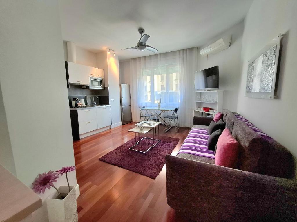 Телевизор и/или развлекательный центр в Gran Vía Exclusive Apartamento Temporal