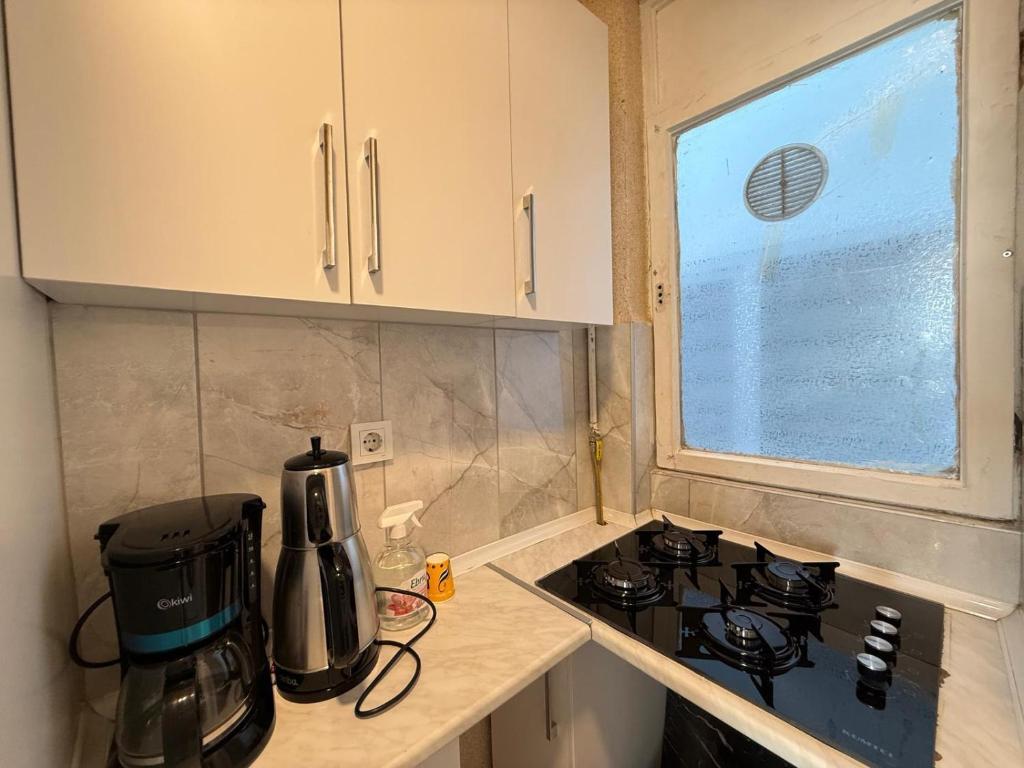 Η κουζίνα ή μικρή κουζίνα στο Nilar Apartments Flat in şişli